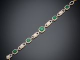 an emerald and diamond bracelet