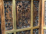 an image of a close up of a wooden door with glass panels