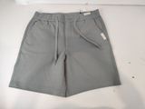the shorts are grey and have a white tag on the side