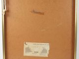 an image of a picture of a brown suitcase with a label on it