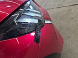 a close up of a car ' s headlight and tail light