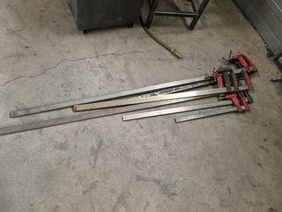 three tools that are laying on the floor