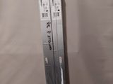 two nintendo wii game controllers sitting on top of each other