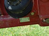 a close up view of a red trailer with a black top