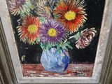 a painting of flowers in a blue vase on a table
