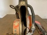 a chainsaw that is sitting on a wooden table