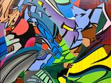 painting of colorful graffiti on a wall in a room