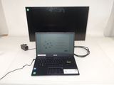 a laptop computer that is sitting on a table