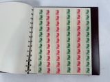 a book with stamps on it sitting on a table