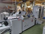 a machine that is sitting inside of a factory