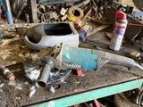 a workbench with tools on it in a garage
