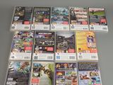 a lot of nintendo wii games on the table