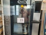 a machine that is sitting in the middle of a kitchen