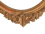 a picture of a gold frame with a mirror in it
