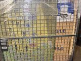 a metal cage with a bunch of boxes on it