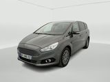 a grey car in a white room with a white floor