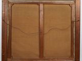 an old wooden frame with a glass window on it