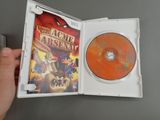 someone is holding a dvd case with a game inside of it