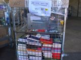a large metal cart with a lot of items in it