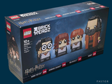 trois figurines Lego représentant Harry Potter et Hermione dans une boîte
