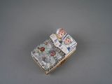a small book that has a picture of a woman on it
