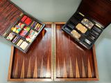two pieces of wood in a wooden box on a table