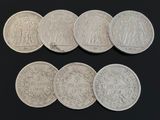 un lot de six pièces d'argent