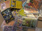 many different types of pokemon cards on the table