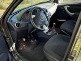 the interior of a car with the door open and the passenger seat down