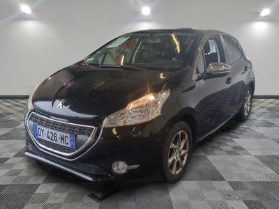 a picture of a black car parked in a garage