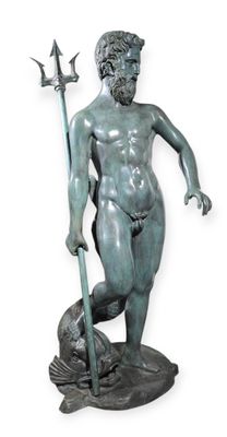 statue of a boy with a spear and a fish on a rock