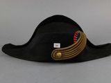 an image of a black hat with a gold band