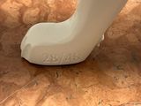 a white telephone sitting on a marble counter top