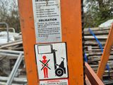 a sticker on the back of a forklift