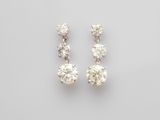 a pair of diamond earrings