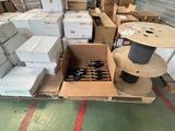 a large amount of boxes on a pallet in a warehouse