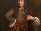 portrait of a man in a brown coat and white shirt