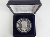 an image of a silver coin in a blue box