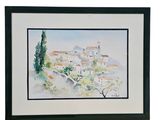 framed watercolor painting of a village with a church in the distance