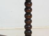 a close up of a wooden table with a white background