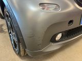a close up of a car ' s front bumper and bumper