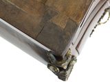 a close up of a wooden table with a metal base