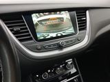 a picture of a car dashboard with a car ' s rear view camera