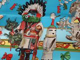 a colorful picture of a man and a woman in native clothing