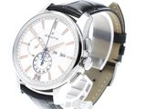a close up of a watch on a white background