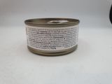a can of canned food sitting on a table