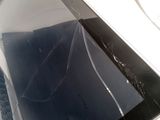 a broken screen of a tablet computer on a table