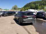 a lot of cars parked in a parking lot