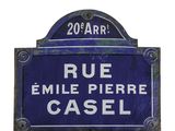 a blue sign that says rue emile perre casel on it