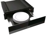 une photo d'un tiroir contenant des assiettes et encore des assiettes